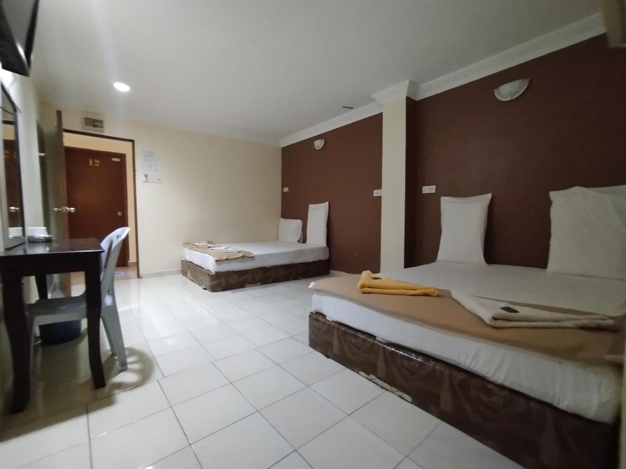 Sentosa Villa Hotel Klang Bagian luar foto